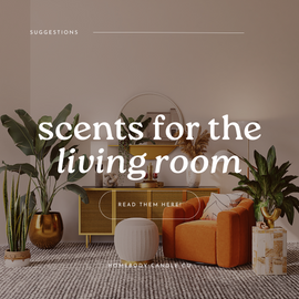 photo of a living room with a candle lit in the background